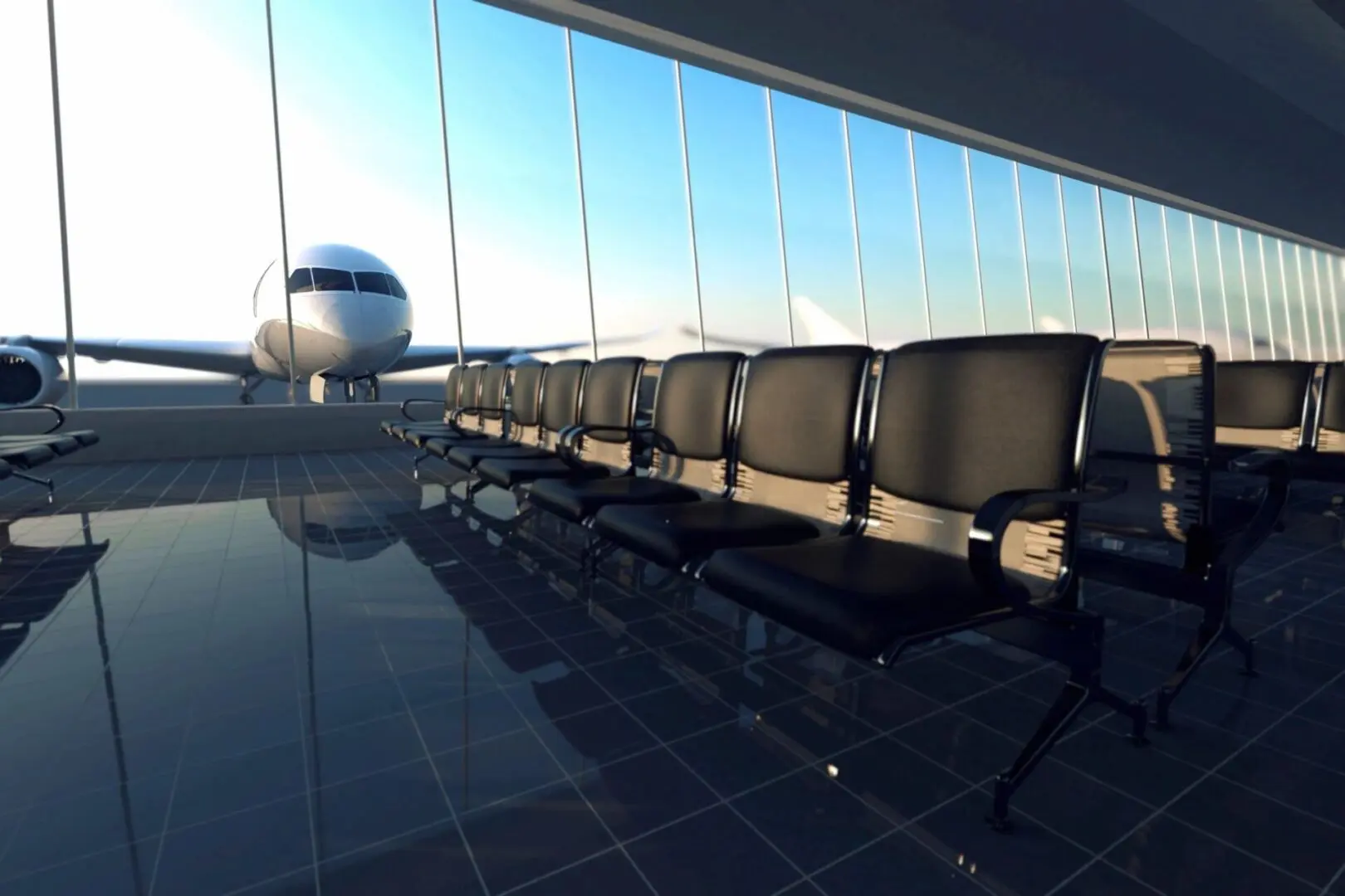 A row of chairs in front of an airplane window.